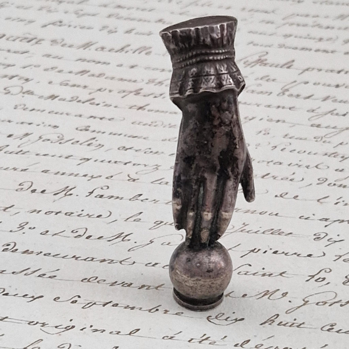 Antique "Victorian hand" office seal in silver-plated metal