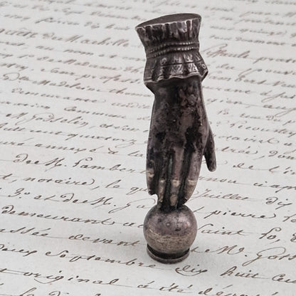 Antique "Victorian hand" office seal in silver-plated metal