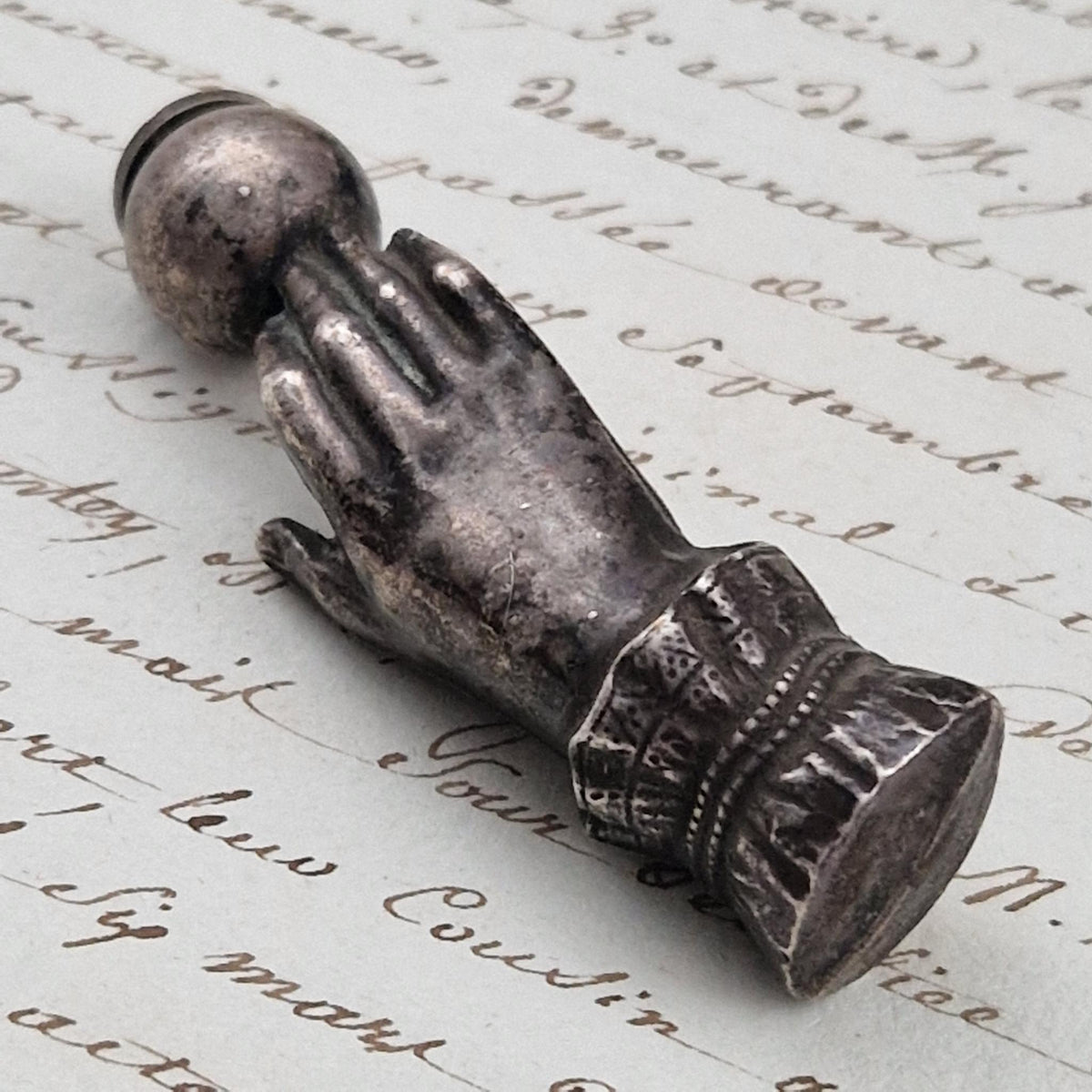 Antique "Victorian hand" office seal in silver-plated metal