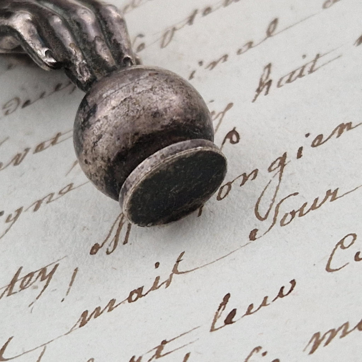 Antique "Victorian hand" office seal in silver-plated metal