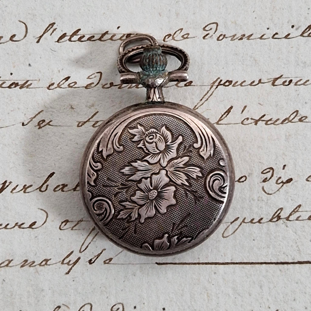 Montre pendentif à décor floral - Pierre Lannier Paris