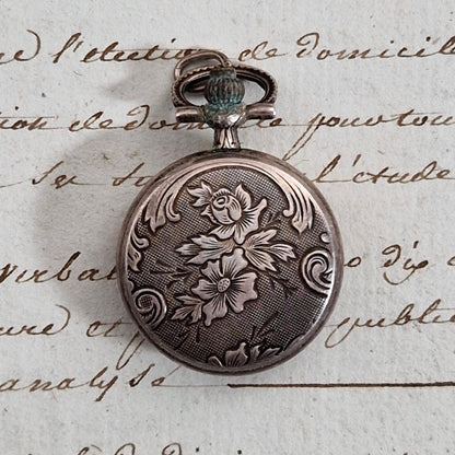Montre pendentif à décor floral - Pierre Lannier Paris