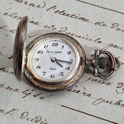 Montre pendentif à décor floral - Pierre Lannier Paris