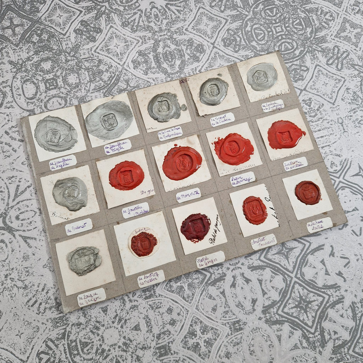 Antique heraldic seals - Red and silver-grey waxes