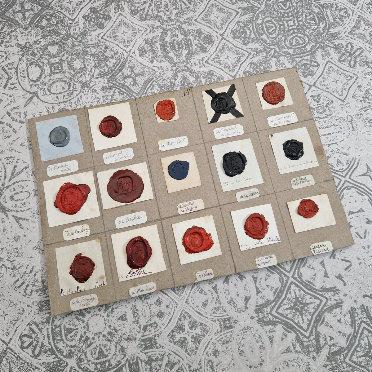 Fifteen heraldic seals - Red, black and blue wax