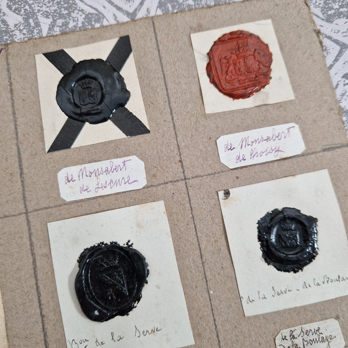 Fifteen heraldic seals - Red, black and blue wax