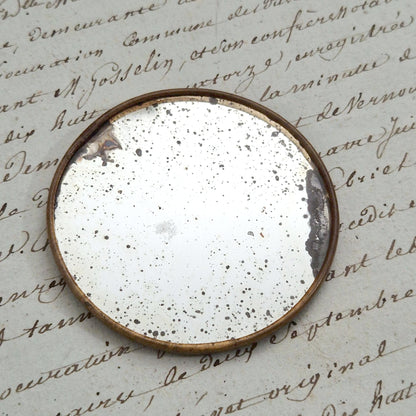Miroir de poche publicitaire Crème Éclipse n&b