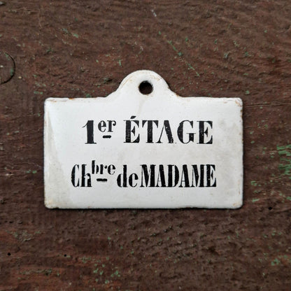 Enamel sign “Madam’s Room – 1st floor”