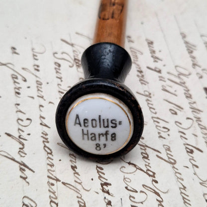 Tirette d’orgue avec bouton émaillé « Aeolus-Harfe / Harpe éolienne »