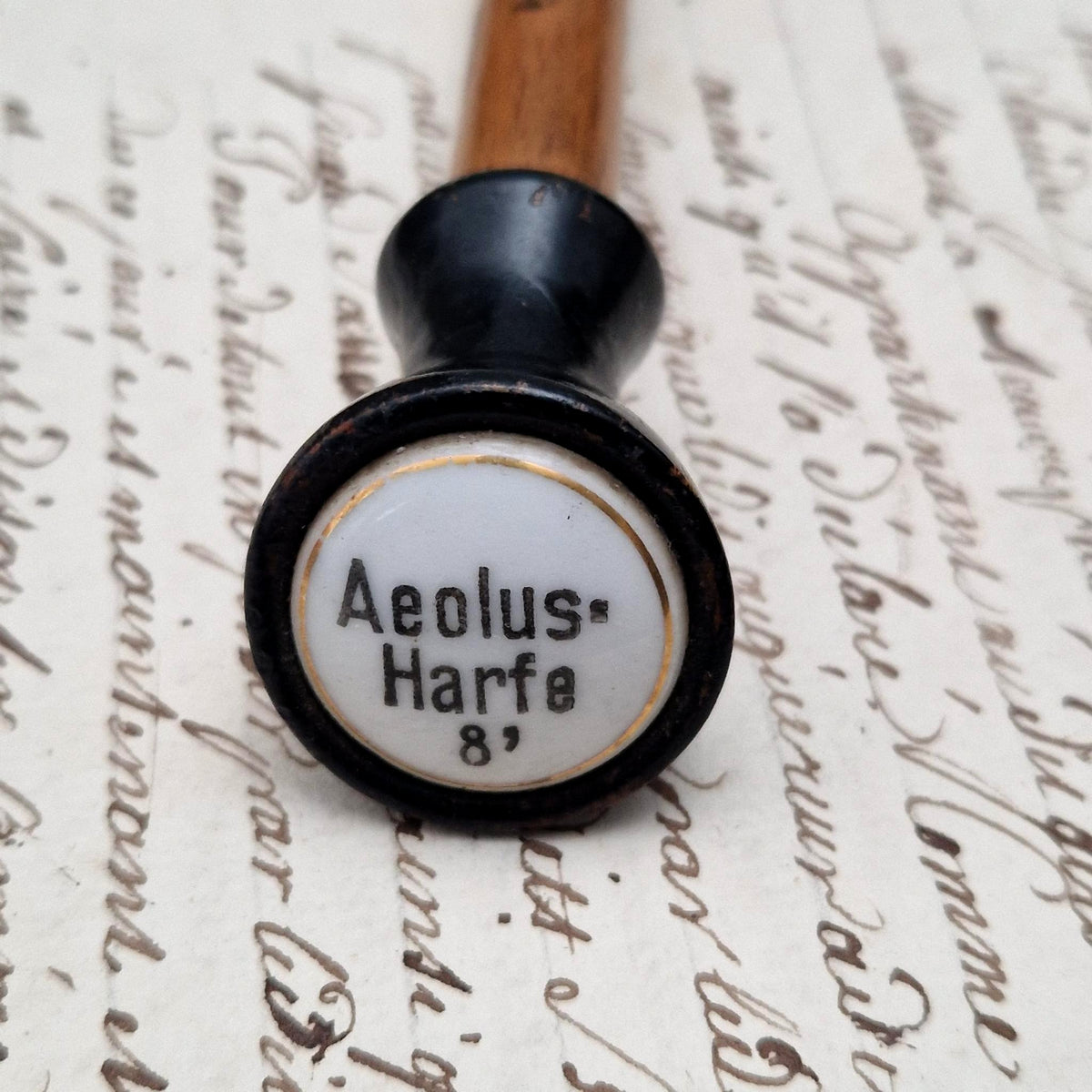 Tirette d’orgue avec bouton émaillé « Aeolus-Harfe / Harpe éolienne »