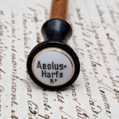 Tirette d’orgue avec bouton émaillé « Aeolus-Harfe / Harpe éolienne »