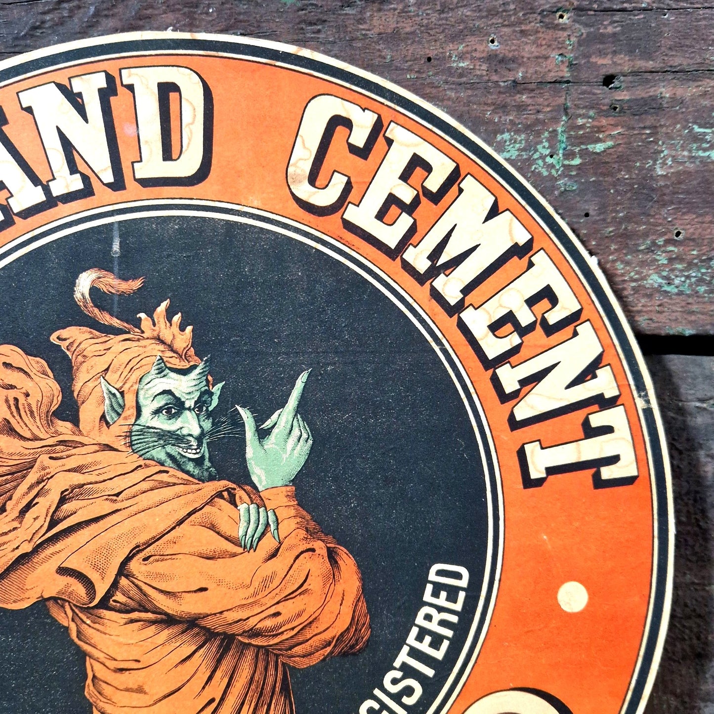 Antique advertising board, Portland-Cement Devil Brand