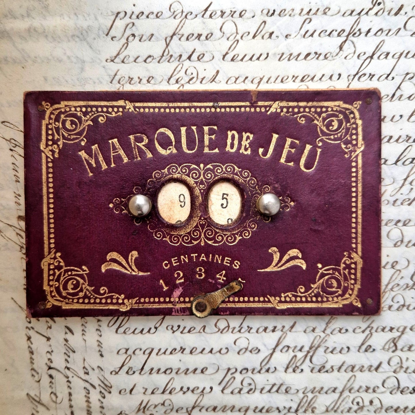 Antique game score counterin embossed board