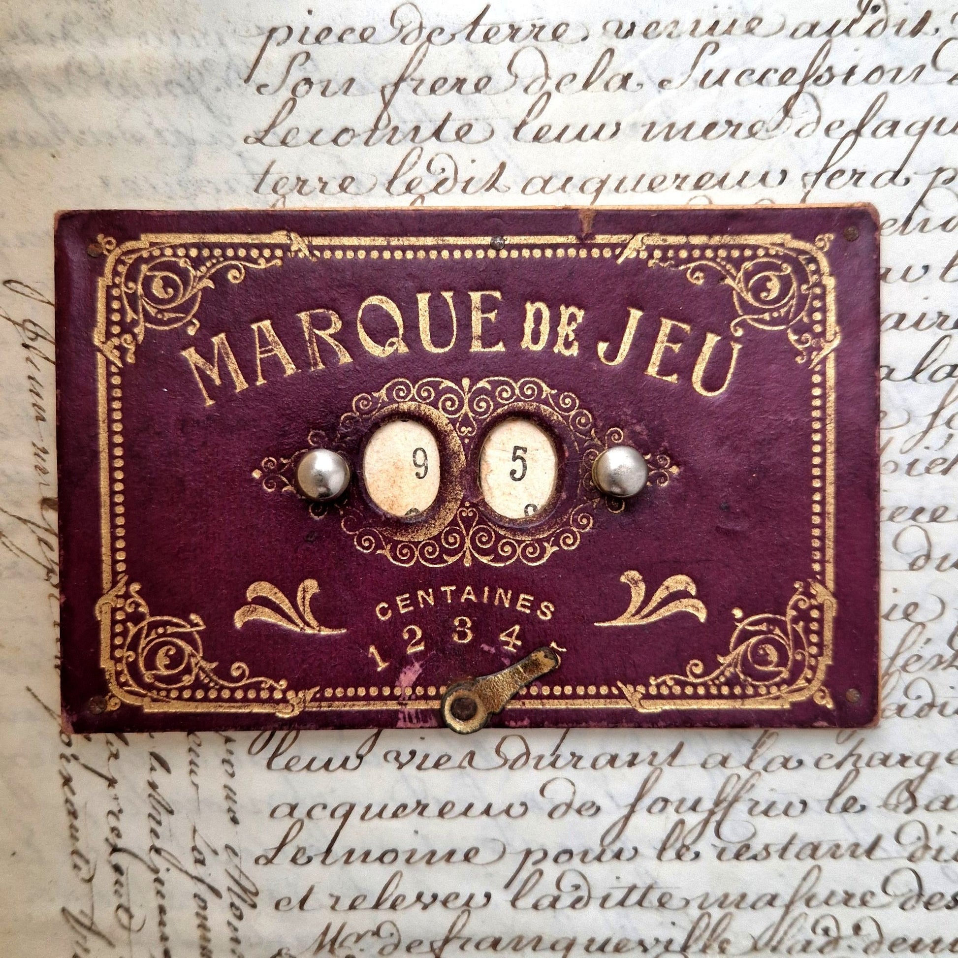 Antique game score counterin embossed board