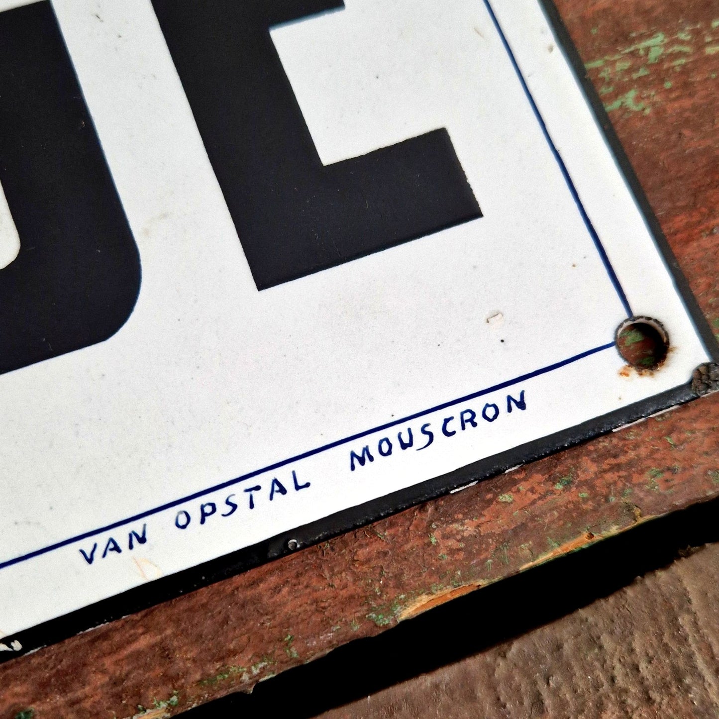 Enamel utility sign Change