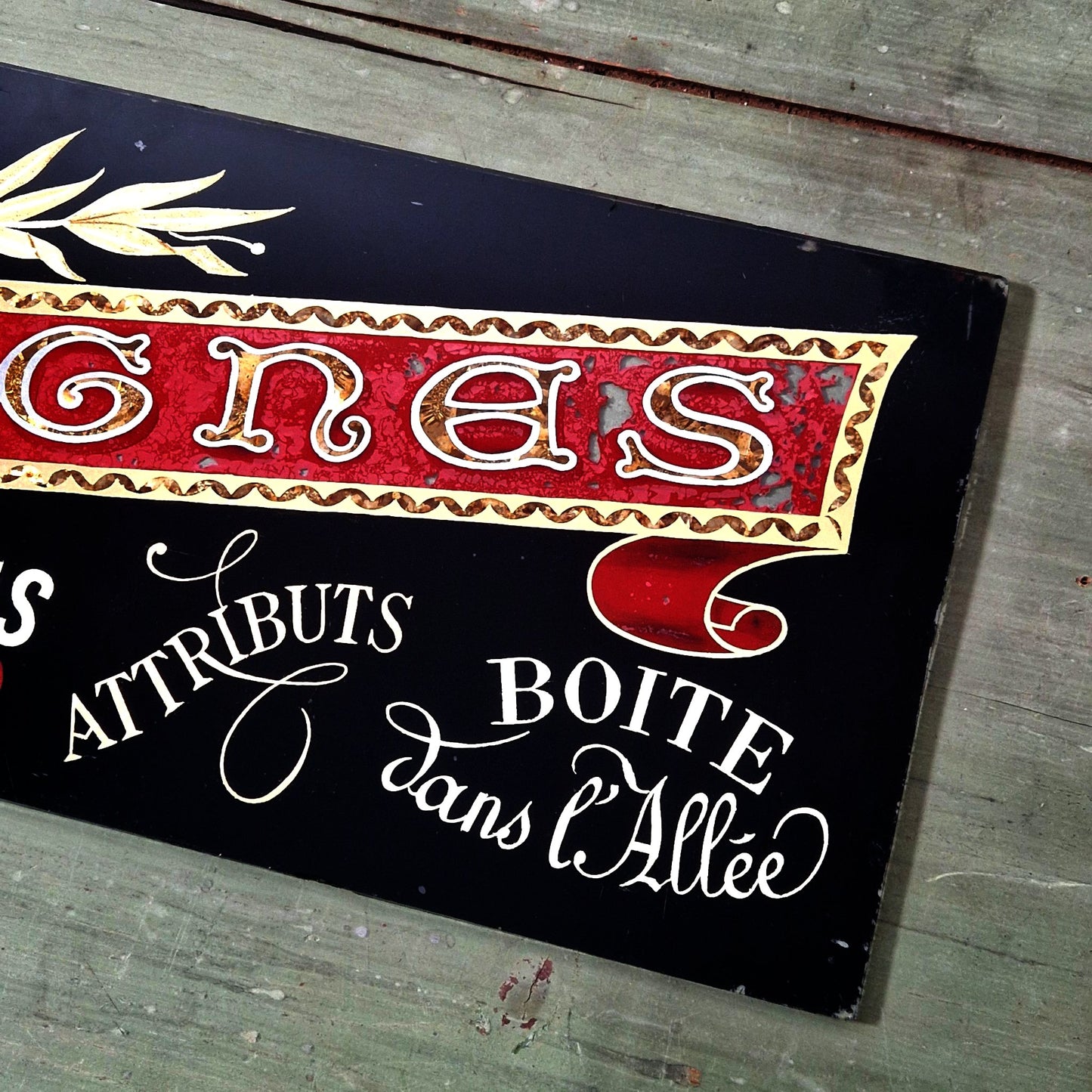 Enseigne en verre églomisé Besset