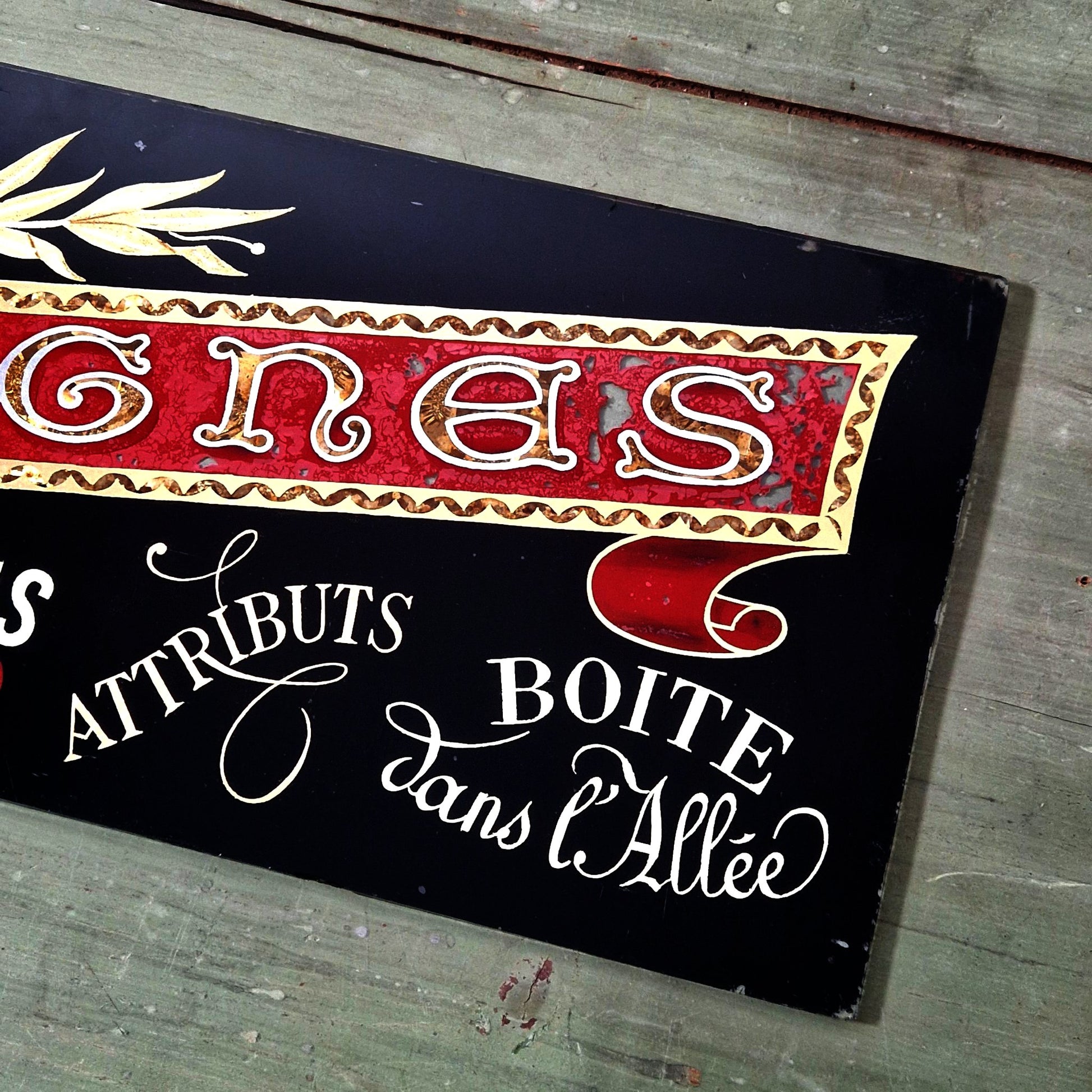 Enseigne en verre églomisé Besset