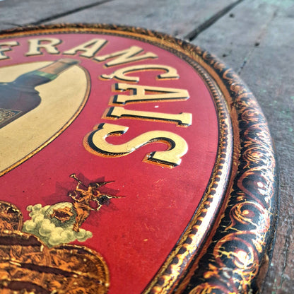 Old advertising sign for Le Francais