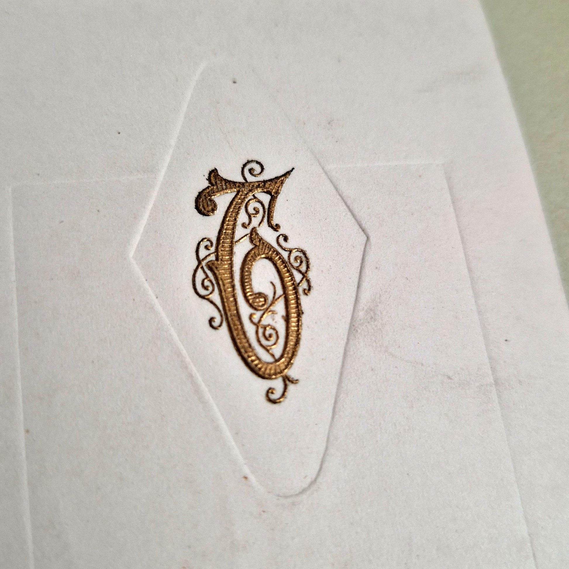 Old specimen album of greeting cards monogram