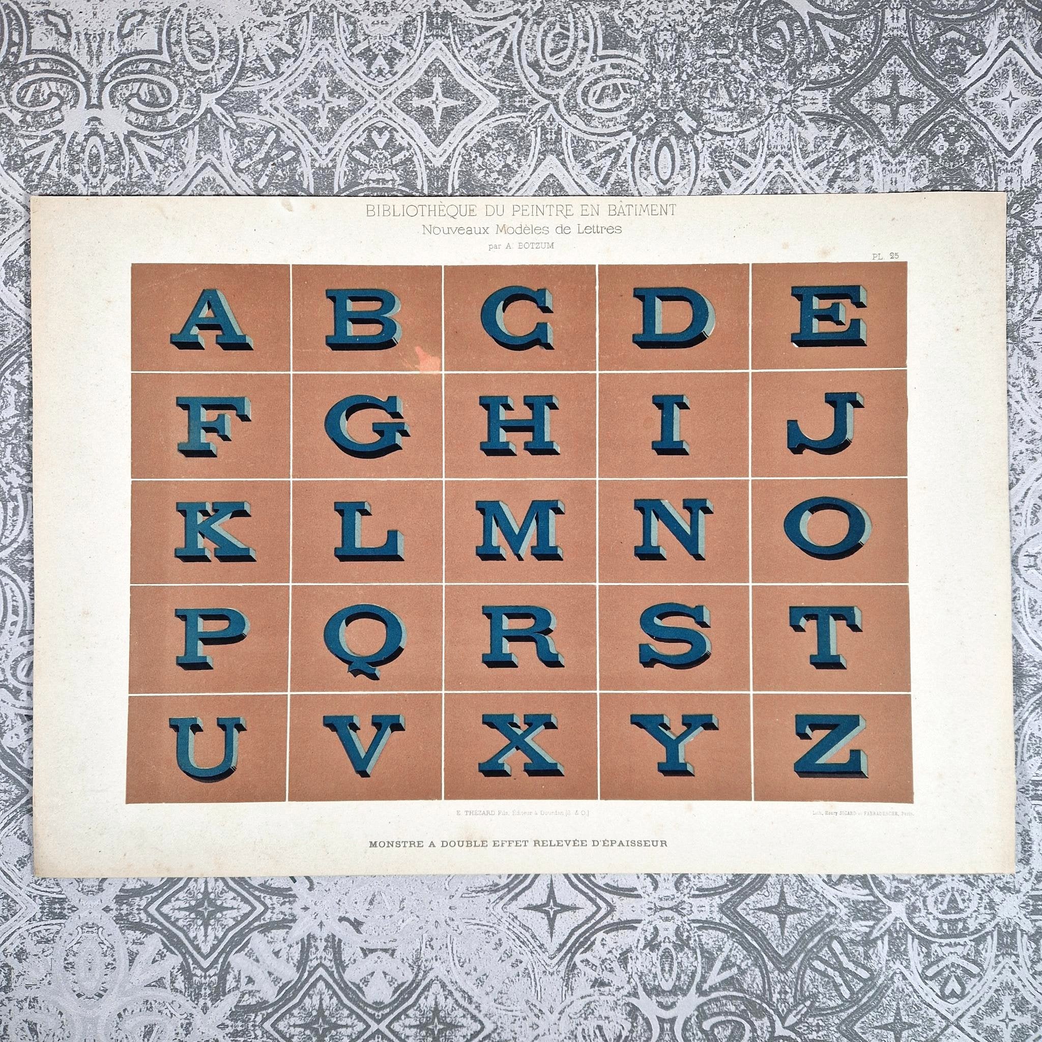 Blue embossed alphabet – “Double-effect monster” – Brocante Jolbro