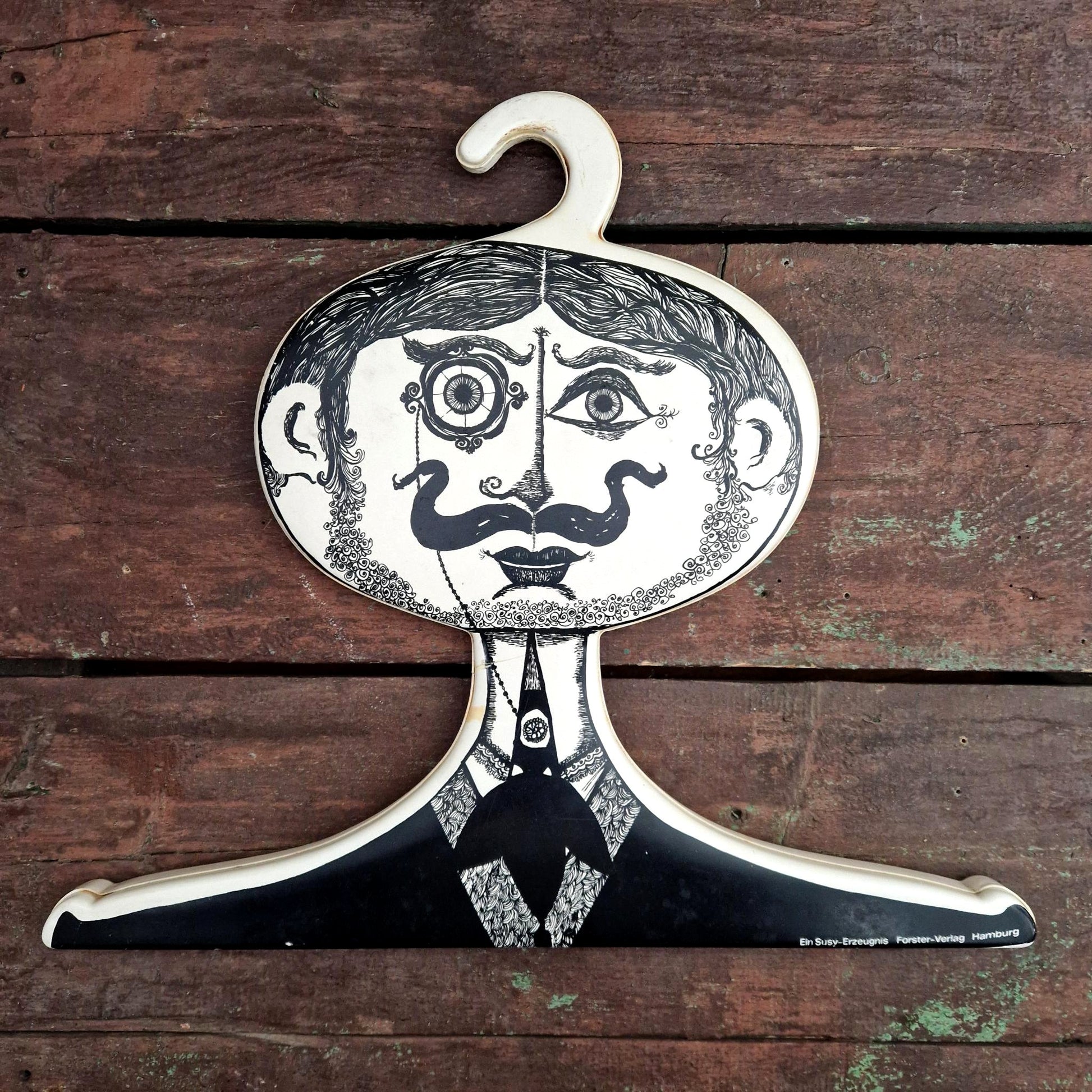 ancien cintre publicitaire dandy monocle