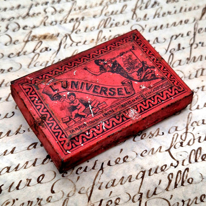 ancienne boite tole litho tampon l'universel