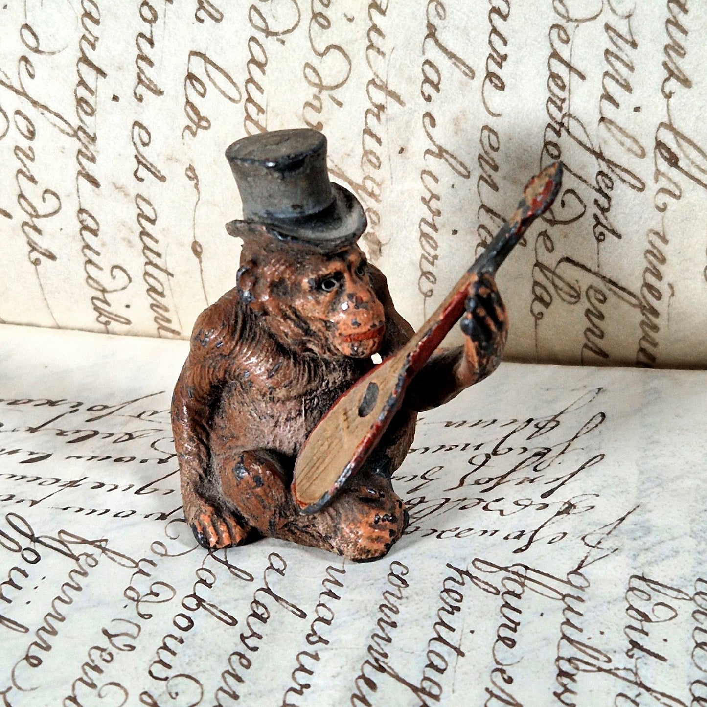ancienne figurine singe musicien regule