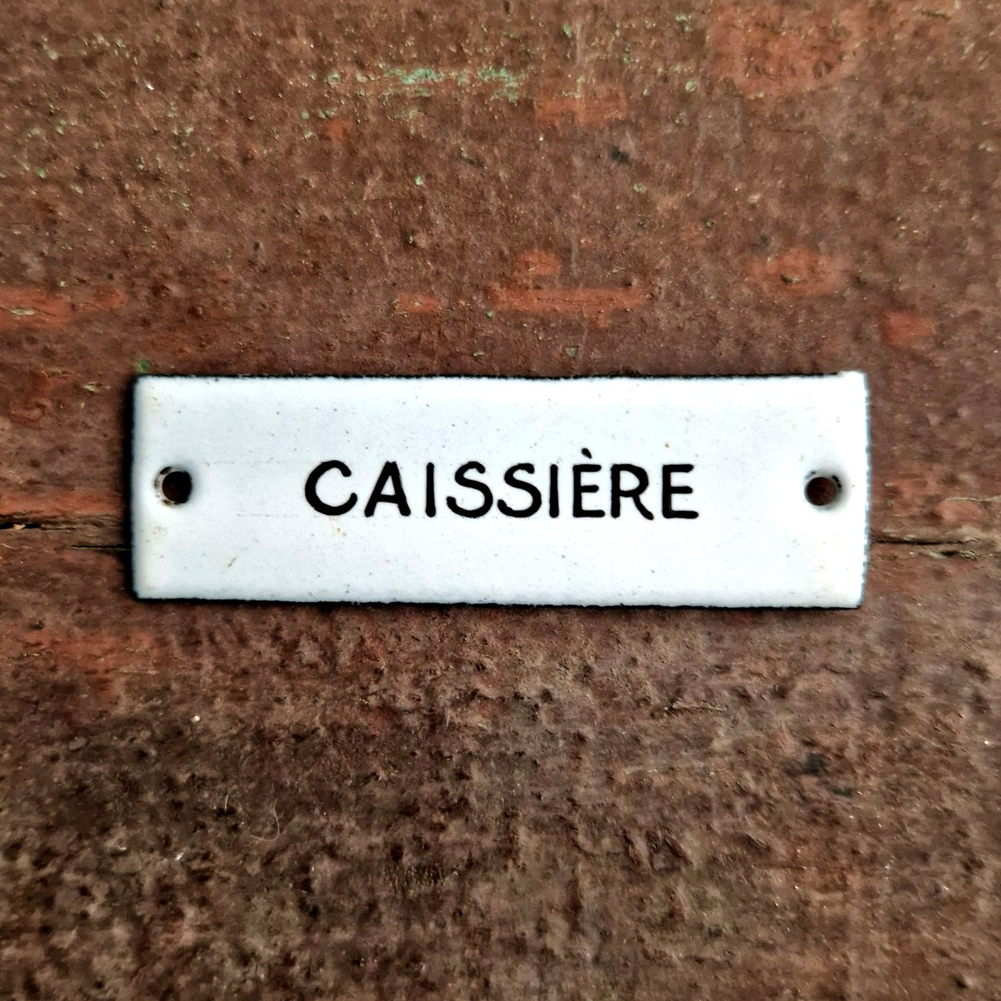 ancienne plaque émaillée caissière