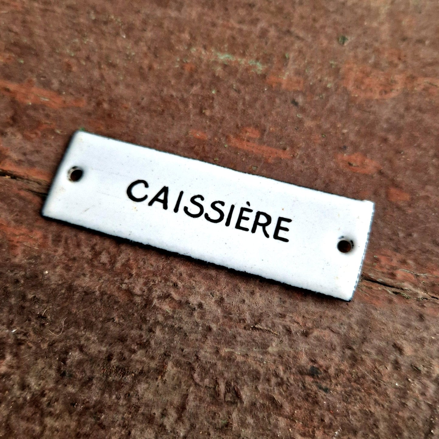 ancienne plaque d'utilité caissière