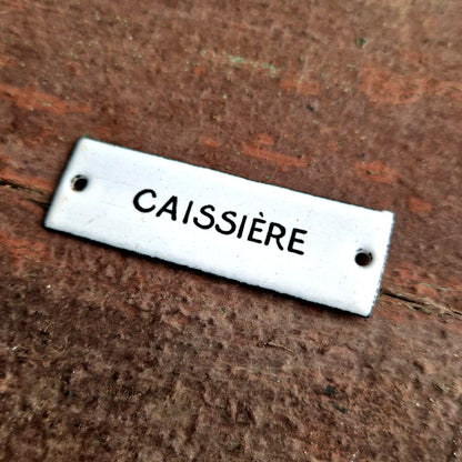 ancienne plaque d'utilité caissière