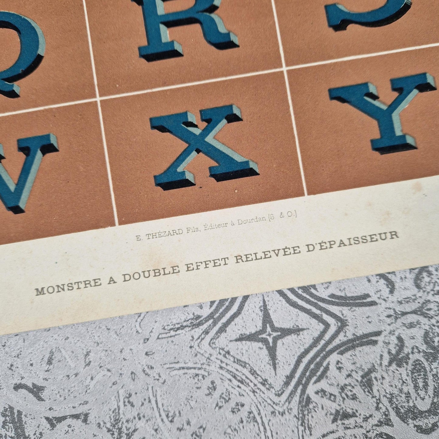 antique blue relief alphabet 1900