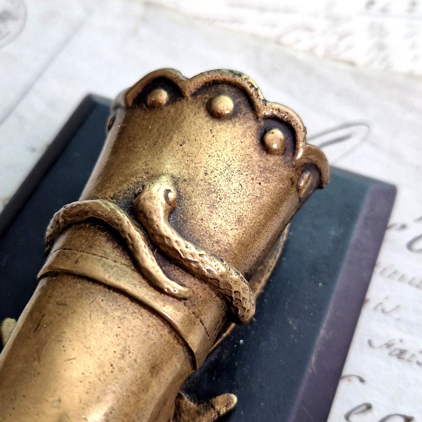 antique bronze hand letter clip snake