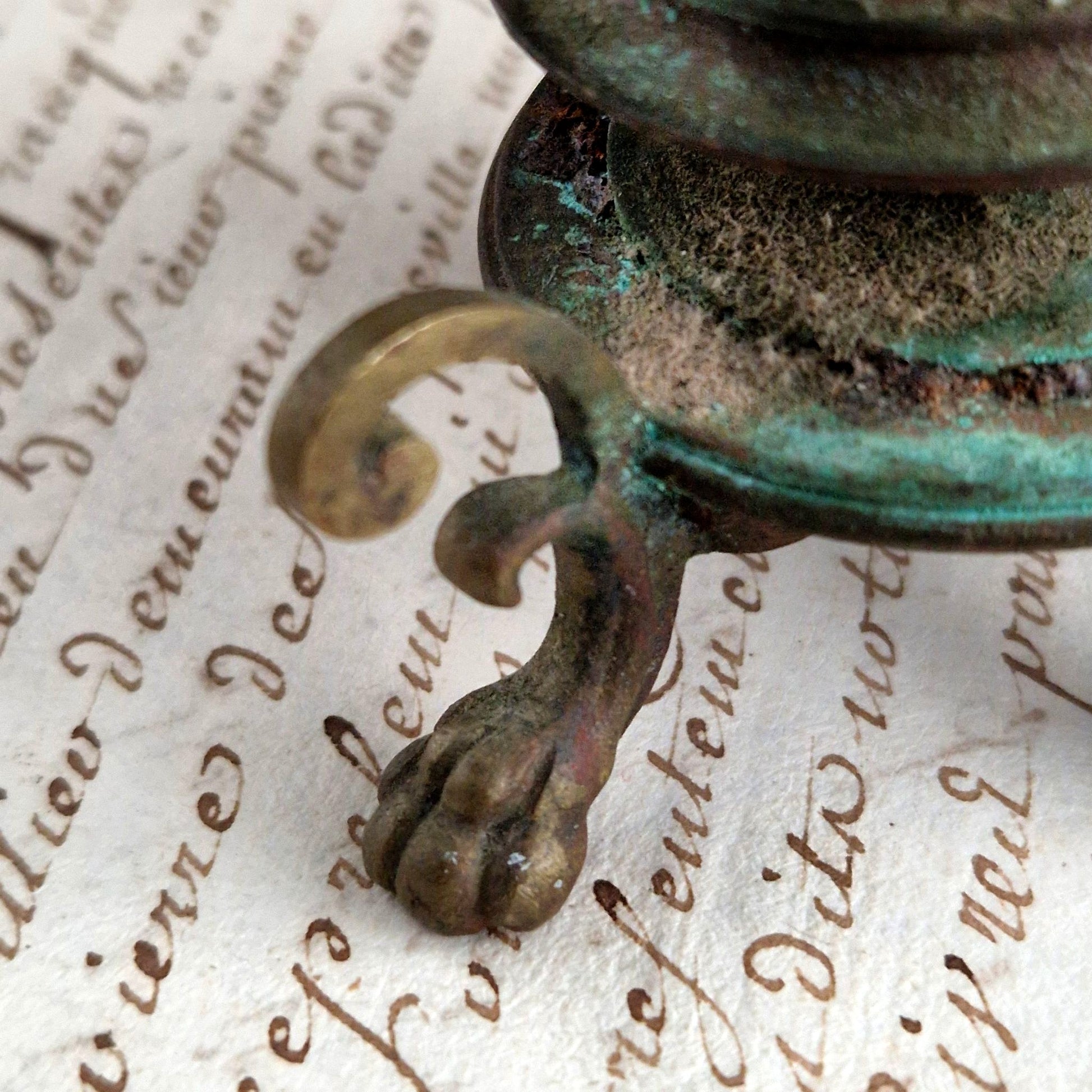 antique bronze hell symbolism