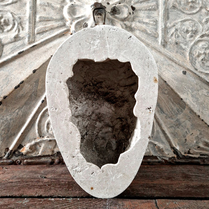 antique devil mask plaster wall