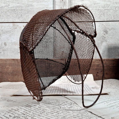 antique fencing mask metal wood stand