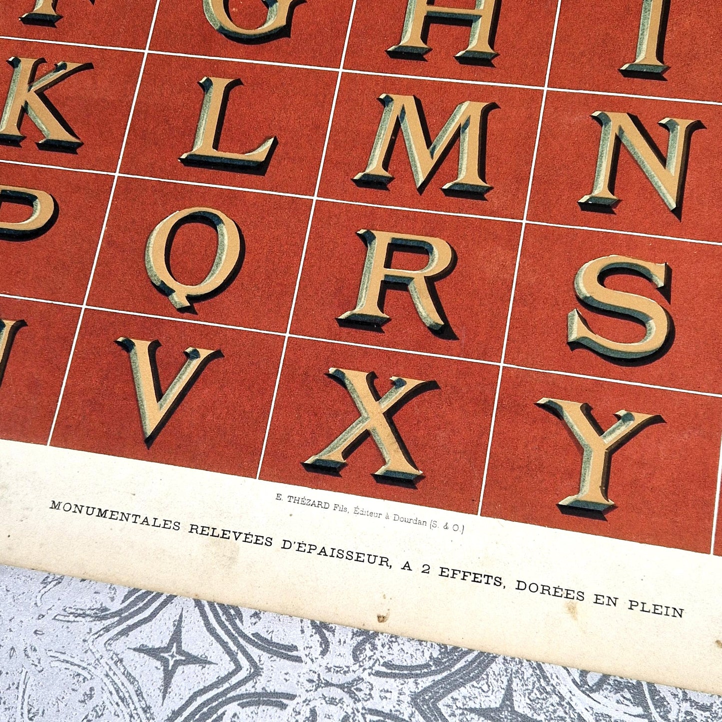 antique gold relief alphabet