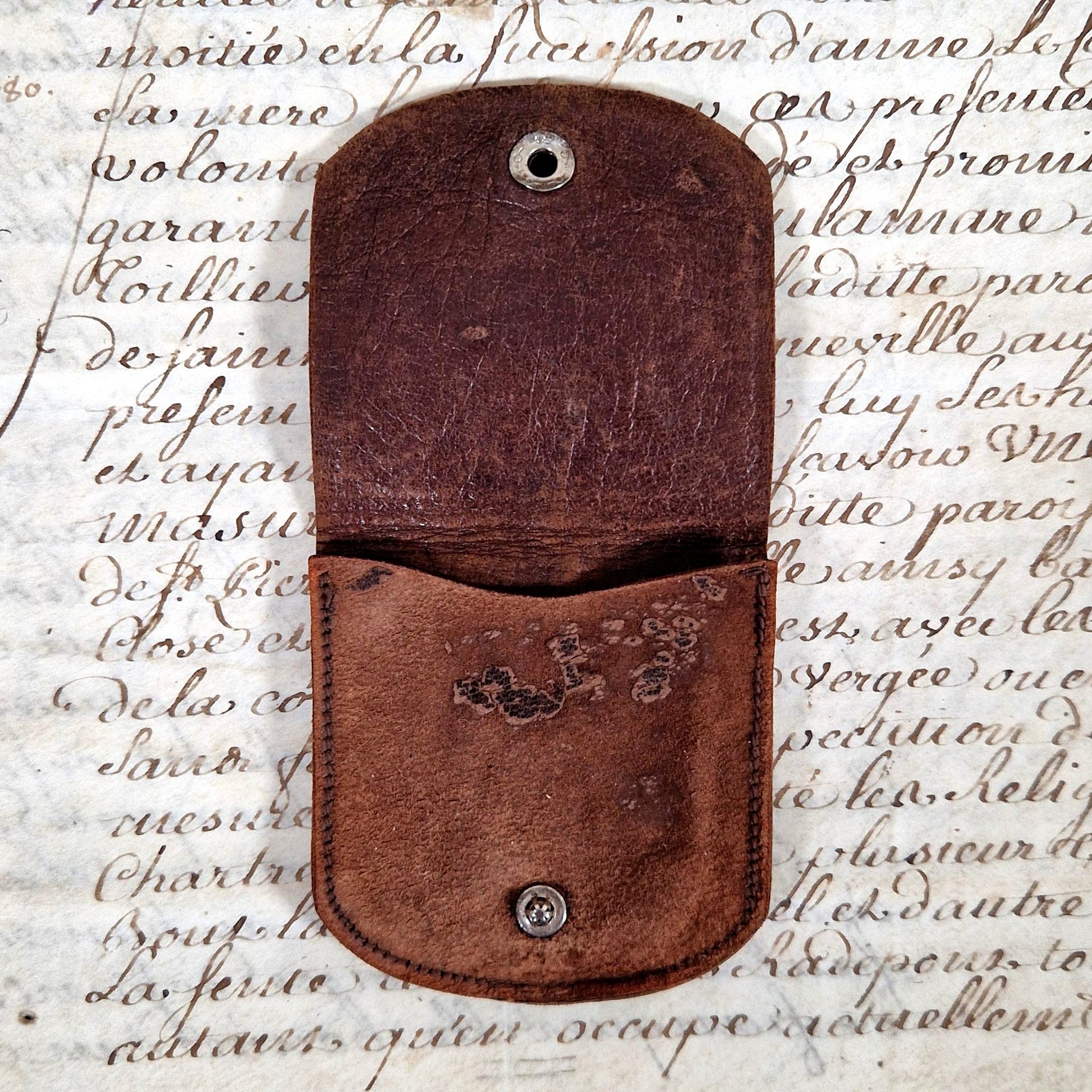 antique leather coin case demon