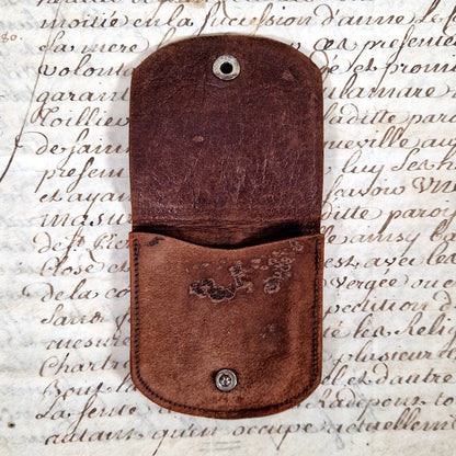 antique leather coin case demon