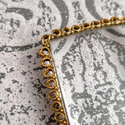 antique magnifying glass gilt