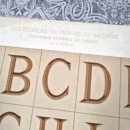 antique monumental alphabet engraved
