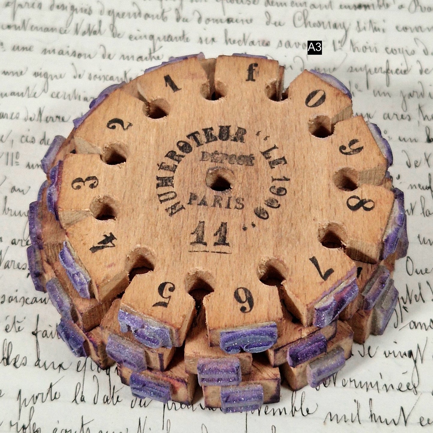 antique numbering wheel paris