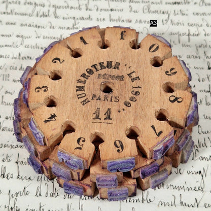 antique numbering wheel paris