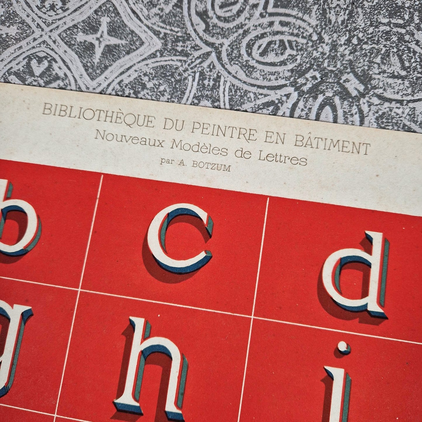 antique roman alphabet shadowed