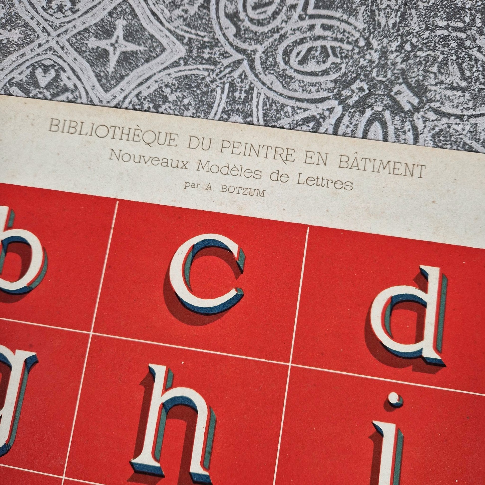 antique roman alphabet shadowed