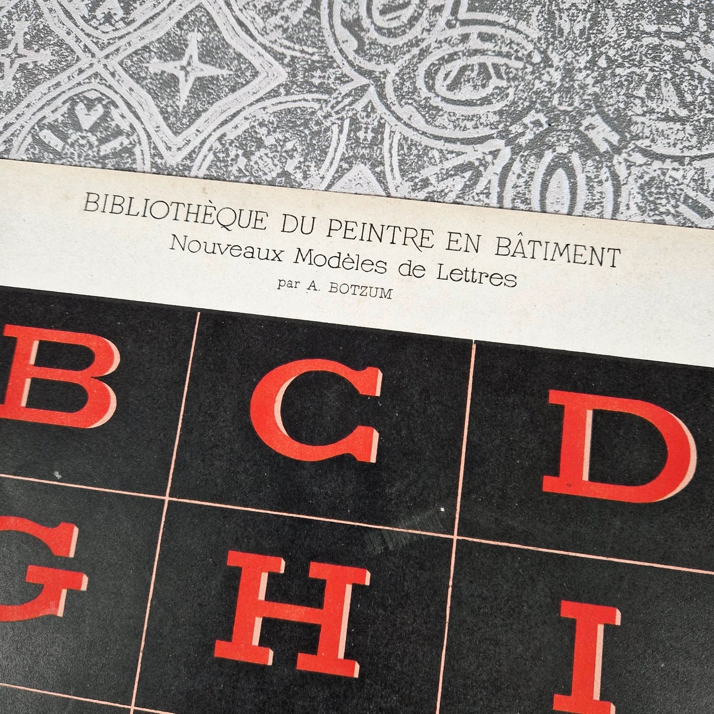 antique shadowed alphabet red black