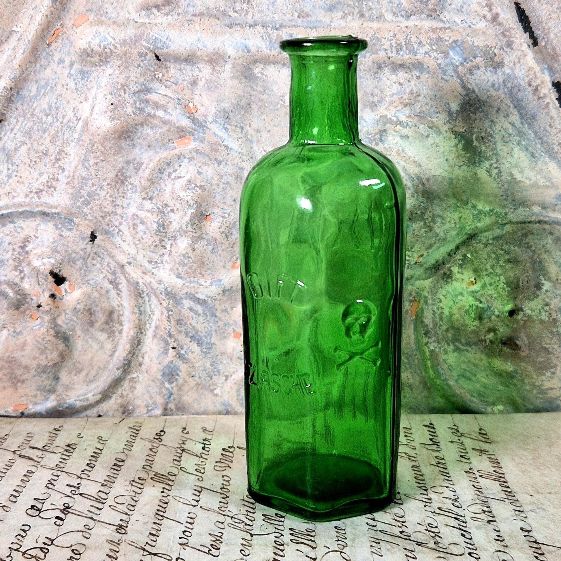 antique toxic bottle skull crossbones