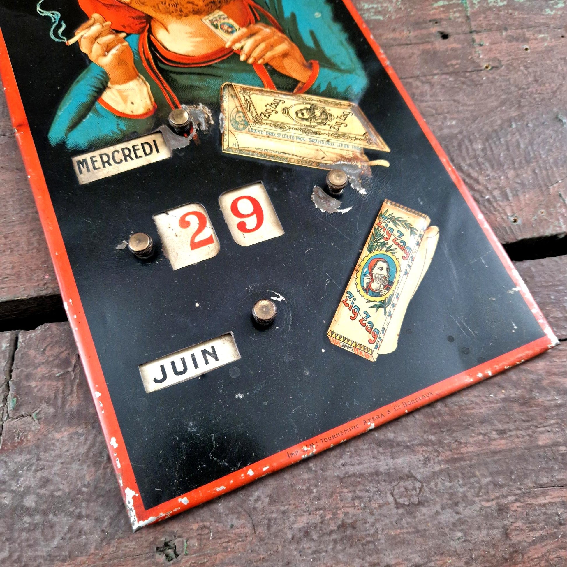 antique zigzag calendar tin sign