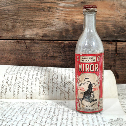 art deco label miror lion noir