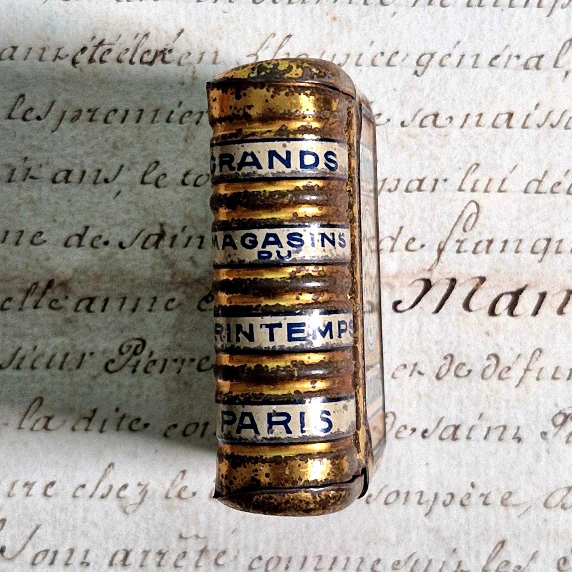 art nouveau lithographed book shaped tin