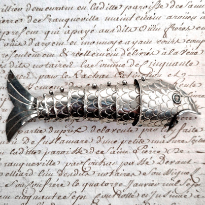 articulated metal fish opener